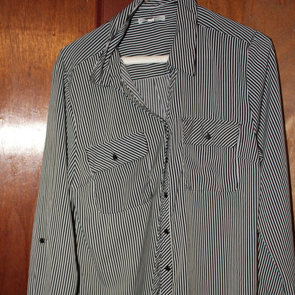 Women's black and white striped button down shirt.
